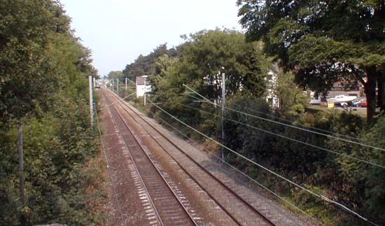 Original Cheadle Hulme Sattion (white building), with the Hesketh across to the right (1999).